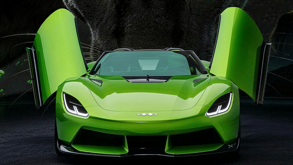 Front view of a bright green sports car with its butterfly doors open, low aerodynamic body and aggressive headlightslet.