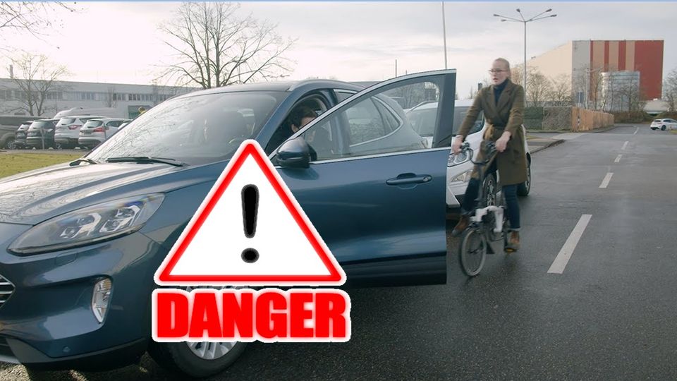 Exit warning system previene il fenomeno: “Car Dooring”