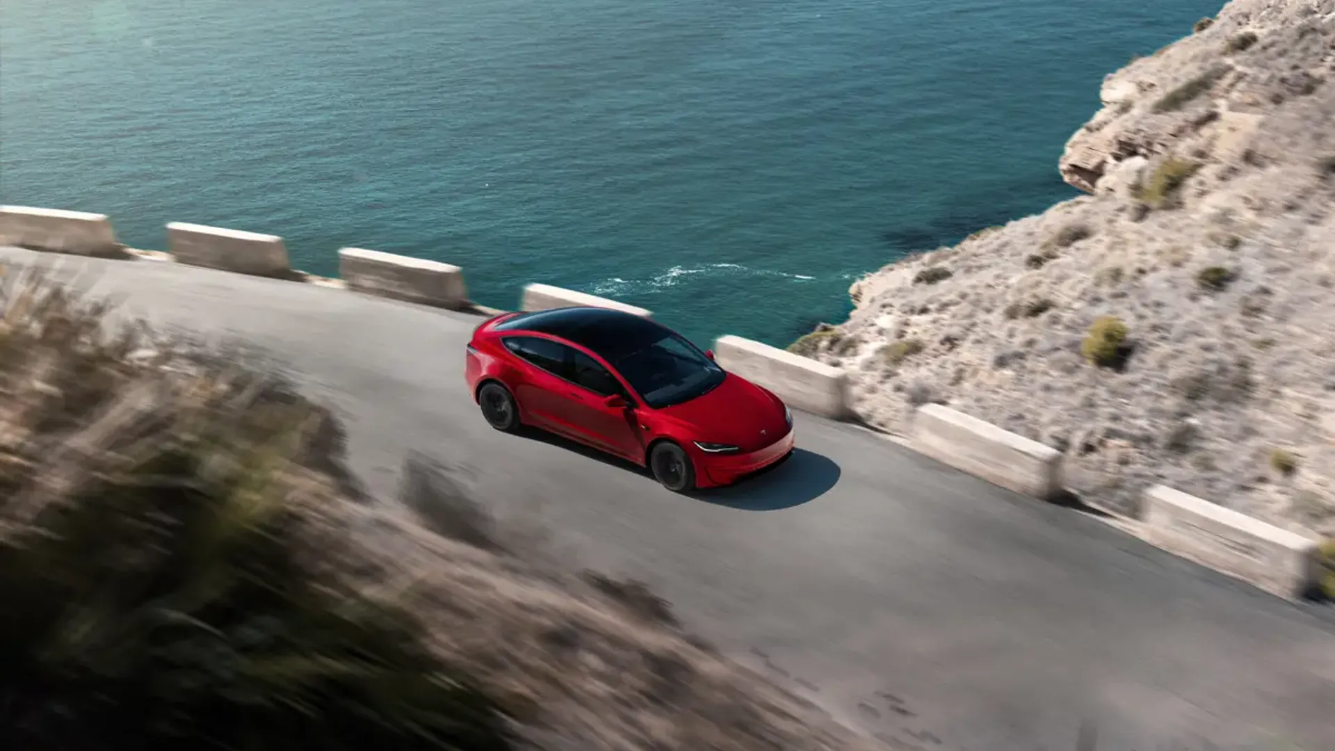 Elettronauti - Tesla Model 3 Performance - Rosso - Esterno - Vista anteriore a tre quarti