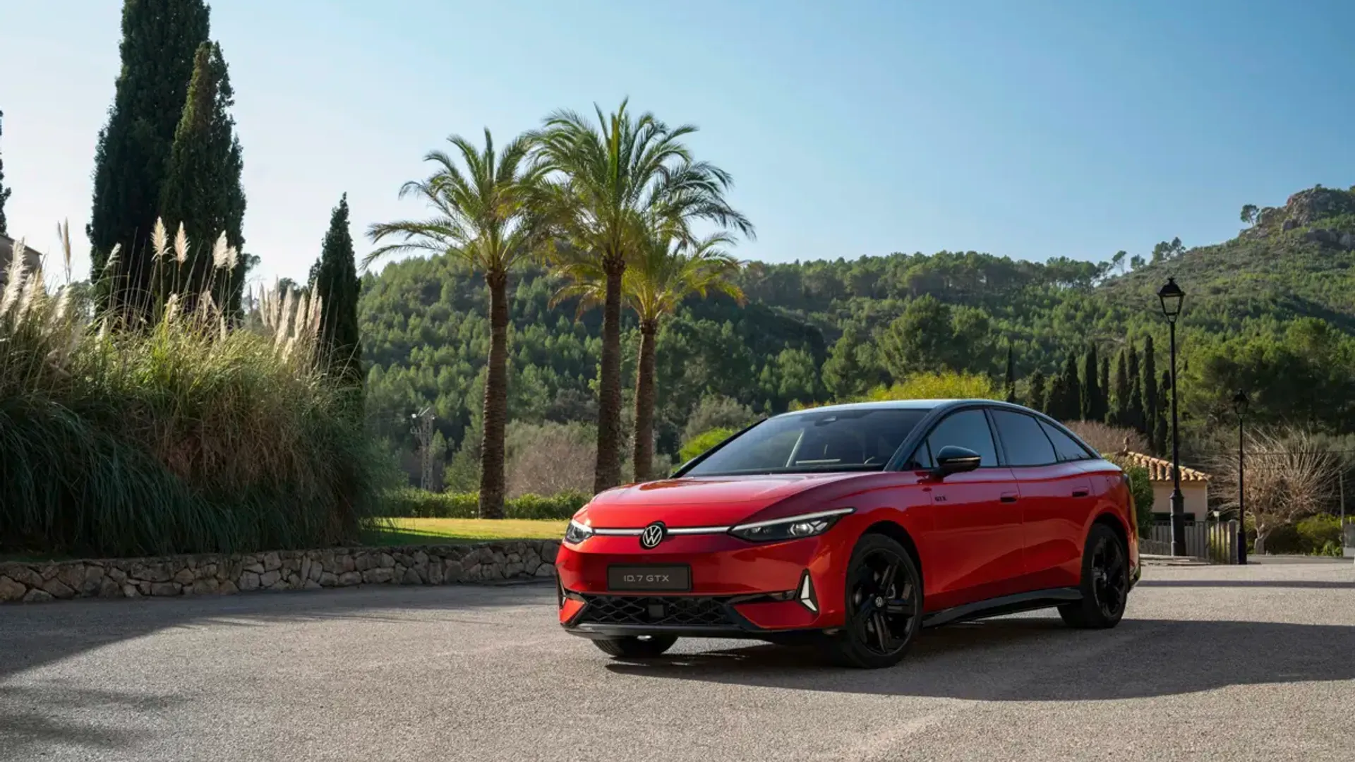 Elettronauti - Volkswagen ID.7 GTX 4MOTION - Rosso - Esterno - Vista anteriore a tre quarti